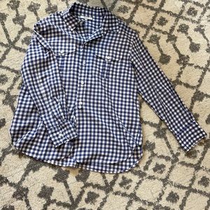 White and blue checkered button up.